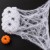 04-pajeczyna-halloween-biala-60g-6-pajakow-zwinieta.jpg